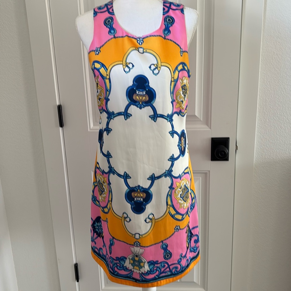 Gorgeous shift dress knee length fully lined 35 inches from shoulder to hem.